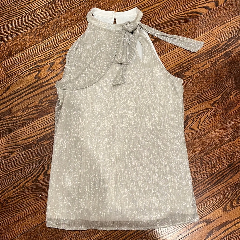 White House Black Market sleeveless blouse. Silver. Lined. Size S. Worn once